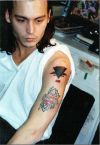 johnny depp left arm tattoo